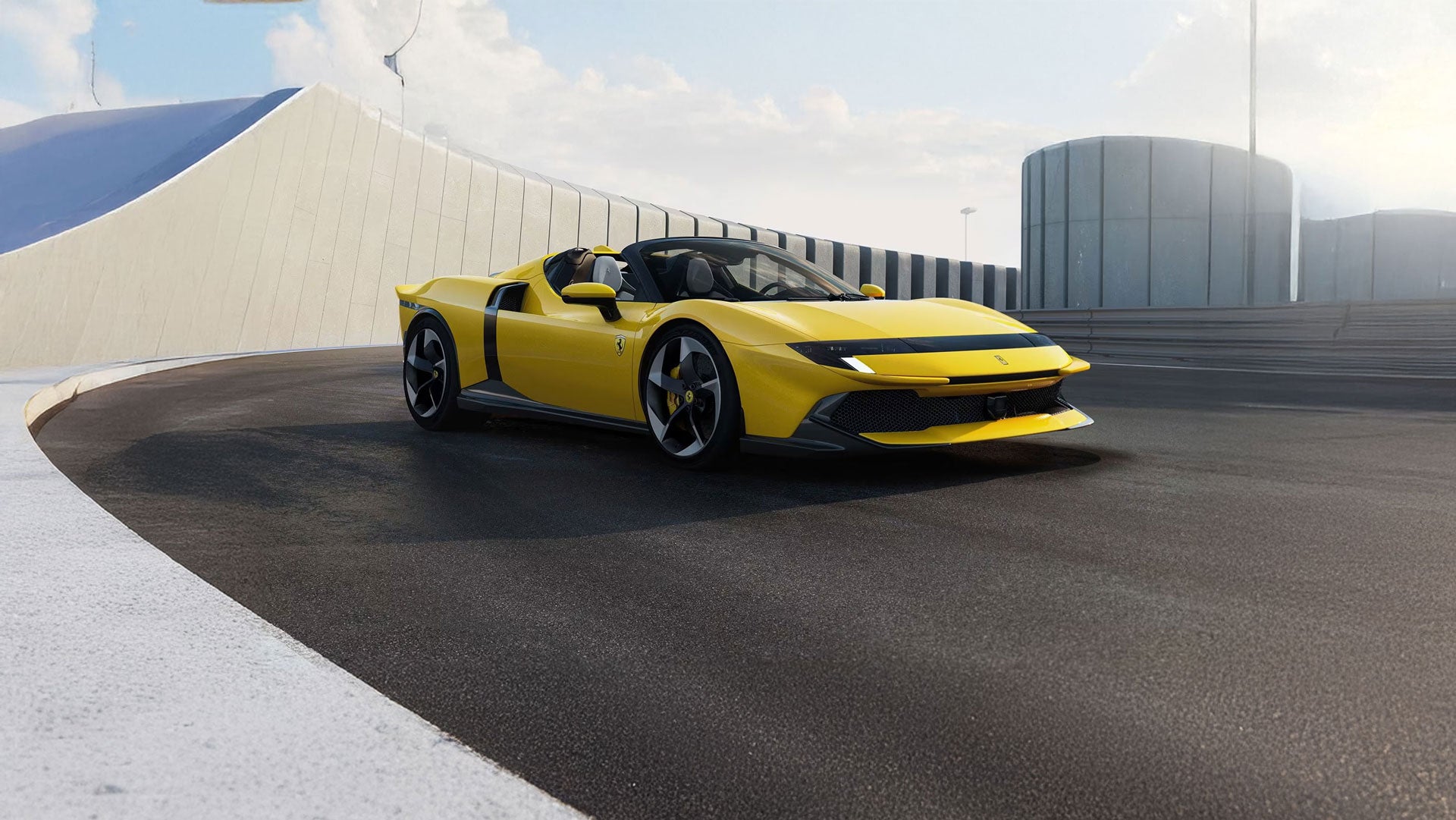 A sleek, yellow Ferrari Daytona SP3 convertible with a black interior on a race track, curving wall in the background.